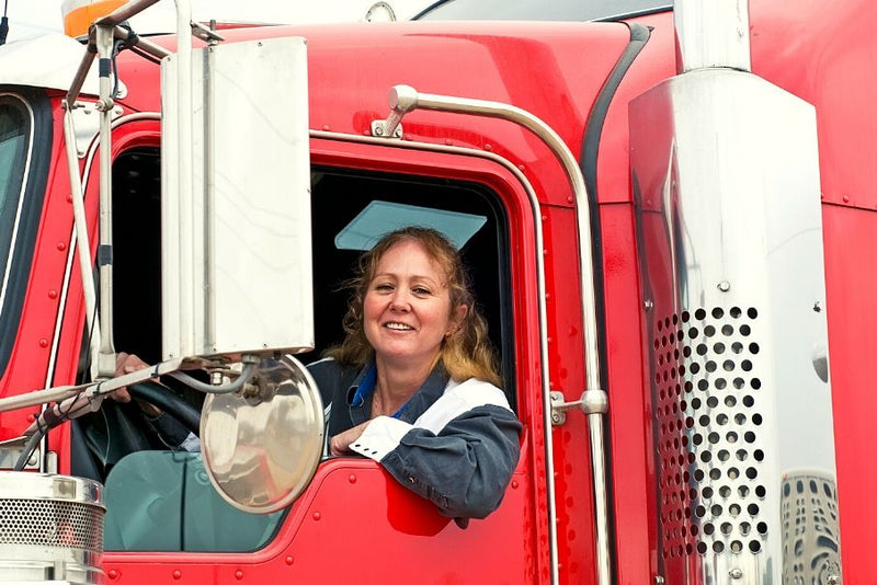 woman driving truck